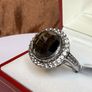 A beautiful silver ring with smokey quartz and white topaz. Image 4