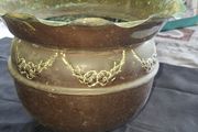 Antique Copper Jardiniere Planter, likely dating from around 1880s to 1920s. It features a distinctive scalloped, or frilled, edge rim. The body is adorned with embossed floral and swag designs.