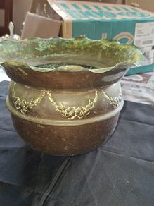 Antique Copper Jardiniere Planter, likely dating from around 1880s to 1920s. It features a distinctive scalloped, or frilled, edge rim. The body is adorned with embossed floral and swag designs.