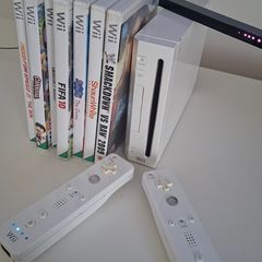 Nintendo wii 2 pads and 7 Games