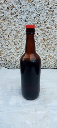 vintage bottle of winters tale sherry 3/4 full ,found in a old pub closed down,