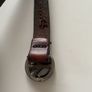 Vintage 1970's Thin Tooled Leather Peace Belt. Image 3