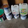 a selection of paint and a paint roller and some good paint brushes Image 3
