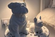 Two ceramic dog ornaments