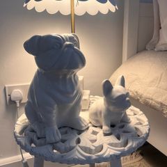 Two ceramic dog ornaments