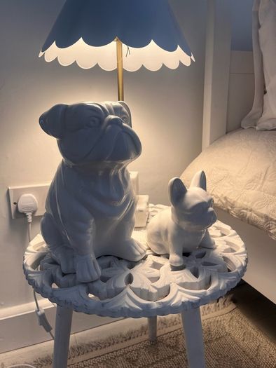 Two ceramic dog ornaments