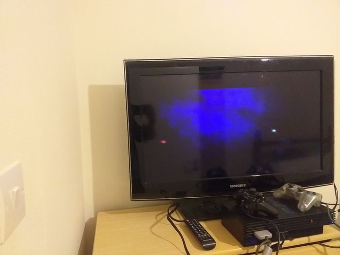 Sony PlayStation 2 console with two controllers