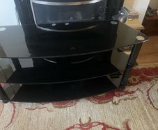Black glass television table