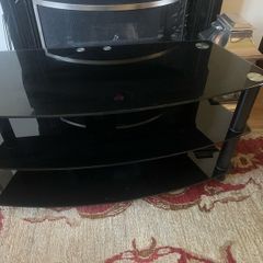 Black glass television table