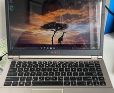 ASUS U46E Laptop - Intel i7, 8GB RAM, 699GB Storage