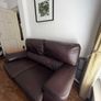 2 seater Arnotts leather couch Image 2