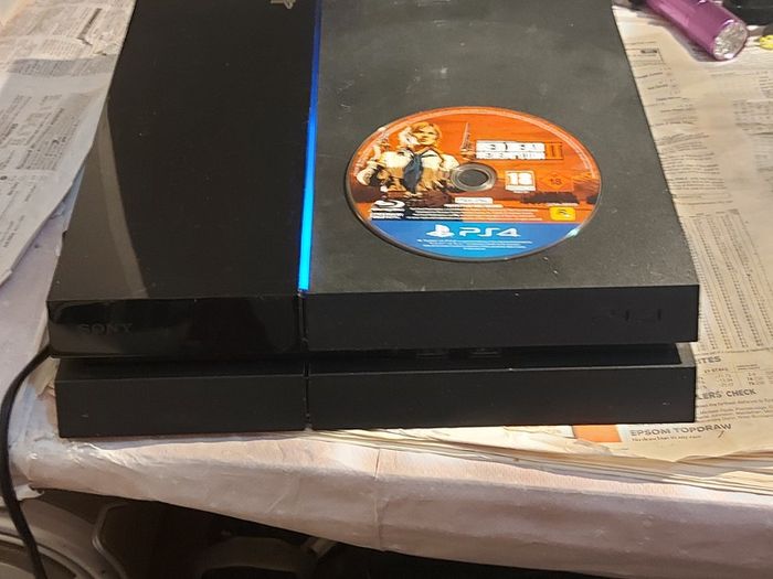 SONY Playstation 4, Model CUH-1003A, Plus RED DEAD II, Redemption PS4 Game, Power Cable and 1 Controller, in excellent cosmetic condition