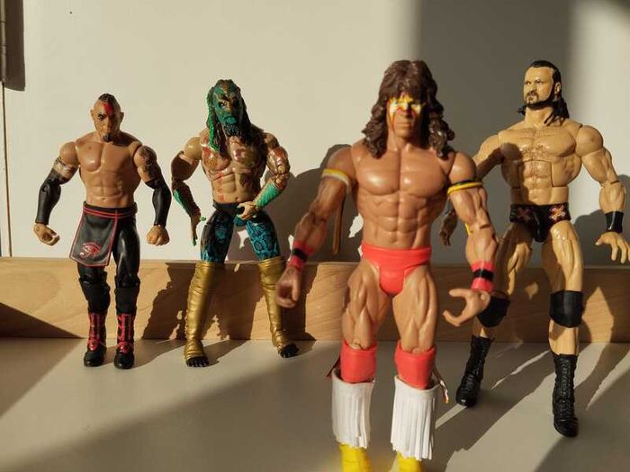 WWE Wrestling Action Figures  4 Figure Bundle