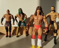 WWE Wrestling Action Figures  4 Figure Bundle