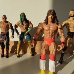 WWE Wrestling Action Figures  4 Figure Bundle