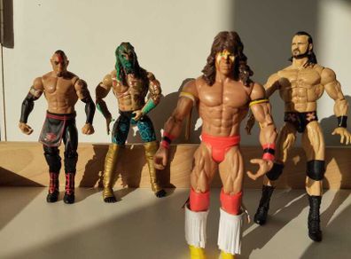 WWE Wrestling Action Figures  4 Figure Bundle
