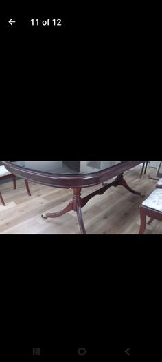 Mahogany Dining room table with 4 chairs and 2 carvers