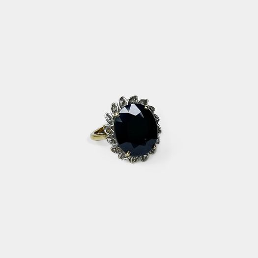 9ct Gold ring with a large sapphire and diamonds
