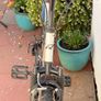 Rockway mountain bike silver and black frame with green accents and a full suspension system. Image 7