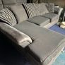 grey/black corner sofa with scatter cushions Image 4