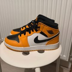 Air Jordan 1 Mid Taxi Limited Edition
