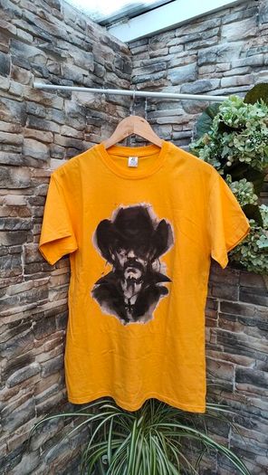 Lemmy from Motorhead t-shirt. Amazing print Brand new.It's a medium on the tag but it would be more of a small to a slim medium.