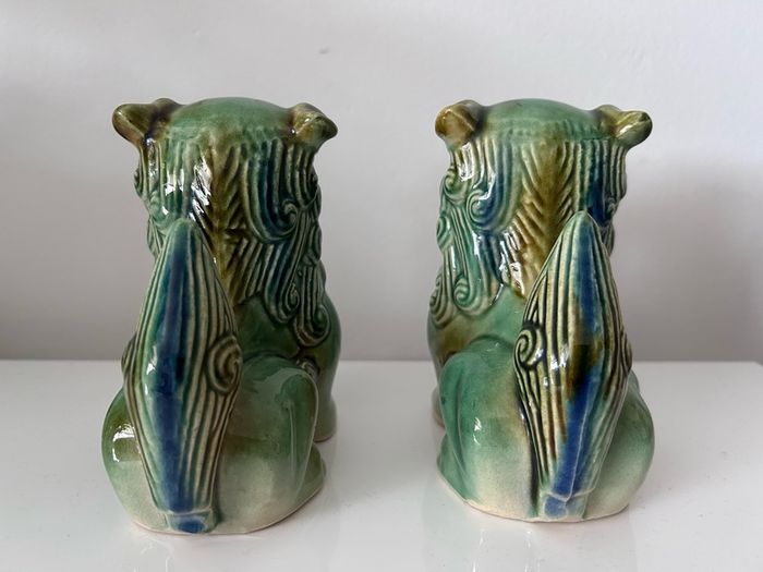 Two vintage Foo dogs in beautiful green glaze