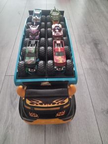 Monster Trucks Transporter and 6 Monster trucks