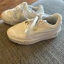 Unisex UK 12 white Puma trainers Image 2