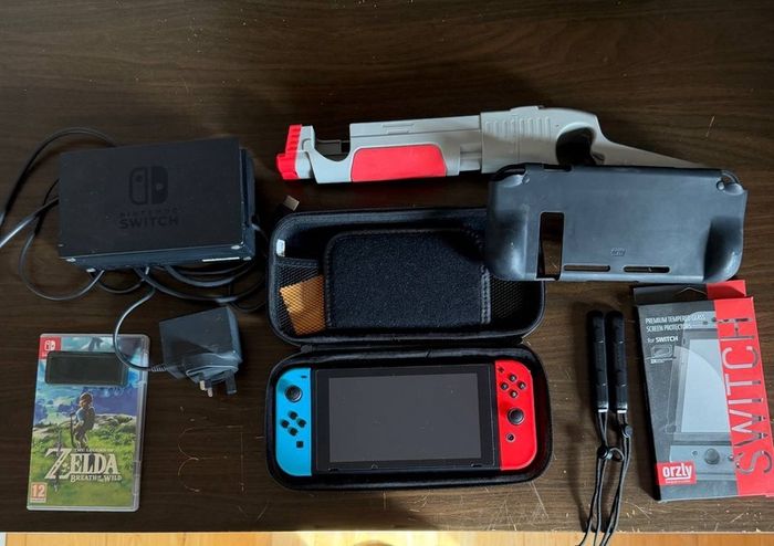 Nintendo Switch + Zelda BOTW ideal condition full pack + cases + protection glass