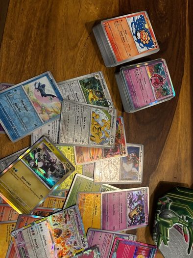 Surging Sparks Bundle Approx. 400 Cards & Paradox Clash Collector Tin