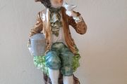 Vintage boy with bird figurine Capodimonte style
