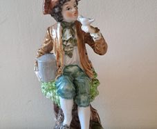 Vintage boy with bird figurine Capodimonte style