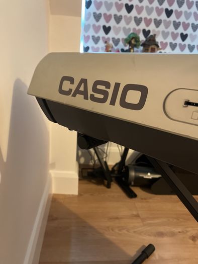 Casio WK-3300 Keyboard with adjustable stand.