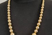 Gold pearl necklace