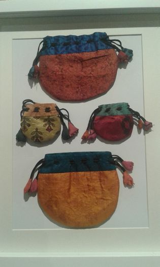 Beautiful framed silk bags from Nepal .
