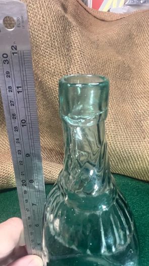 Aqua green Australian chili bottle , 1910