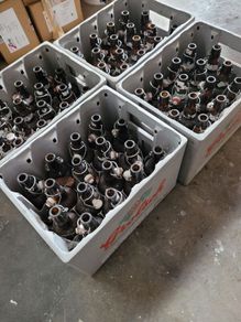 Grolsch beer brown glass bottles with porcelain swing caps.