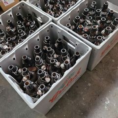 Grolsch beer brown glass bottles with porcelain swing caps.