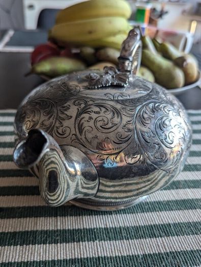 Silverware antique teapot
