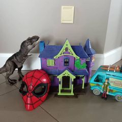 Scooby Doo toys, spiderman mask and dinosaur