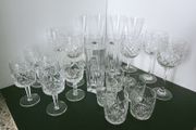 Collection of mismatched crystal glasses and  tumblers