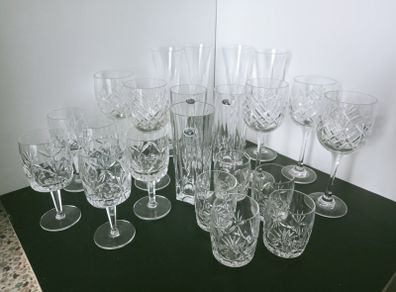 Collection of mismatched crystal glasses and  tumblers