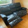 black reclining leather sofa and two armchairs Image 4