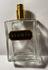 4 empty vintage cologne bottles