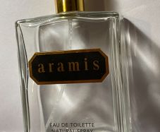 4 empty vintage cologne bottles