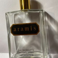 4 empty vintage cologne bottles