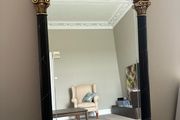 Gilt and black regency style mirror