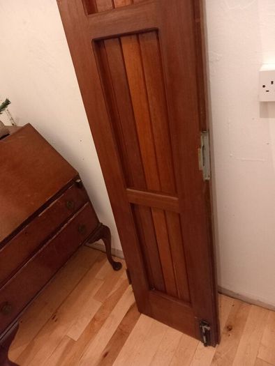 solid teak door with bolt