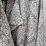 Maje black and white Gadget coat. Mid-weight cotton-jacquard. Front slit pockets, goat trim, fully lined. Asymmetric button fastenings through front. 79% cotton Image 2
